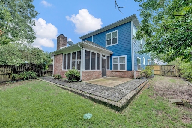 1160 Harbor River Cv, Memphis, TN 38103 - rear view of property featuring a patio area, a chimney, a gate, and a fenced backyard