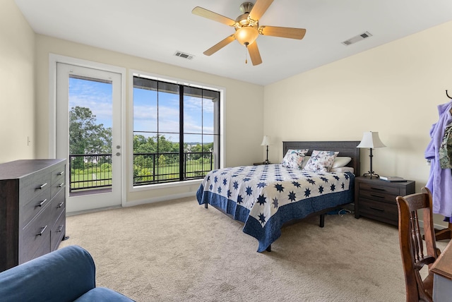 380 N Island Dr Unit 302, Memphis, TN 38103 - carpeted bedroom with access to exterior and a ceiling fan