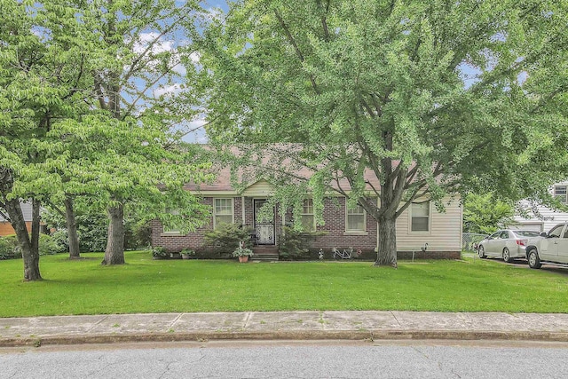 1116 Carrolton Ave, Memphis, TN 38127 - obstructed view of property featuring a front yard
