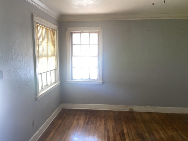 827 E Mallory Ave E, Memphis, TN 38106 - empty room featuring plenty of natural light, hardwood / wood-style floors, and crown molding