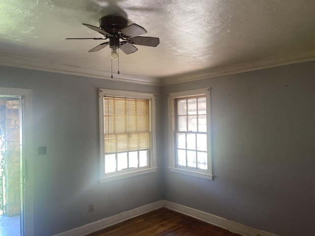 827 E Mallory Ave E, Memphis, TN 38106 - spare room with crown molding, dark wood-style floors, and a ceiling fan