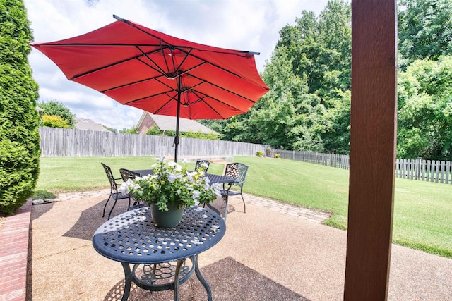 4362 Bridgestone Cir, Bartlett, TN 38135 - fenced backyard with a patio area and outdoor dining area