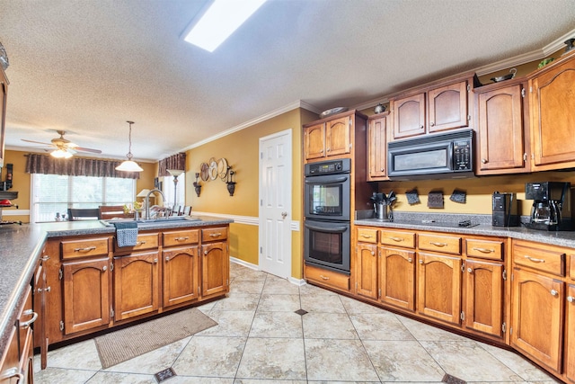 4362 Bridgestone Cir, Bartlett, TN 38135 - kitchen featuring black appliances, brown cabinetry, a textured ceiling, and crown molding
