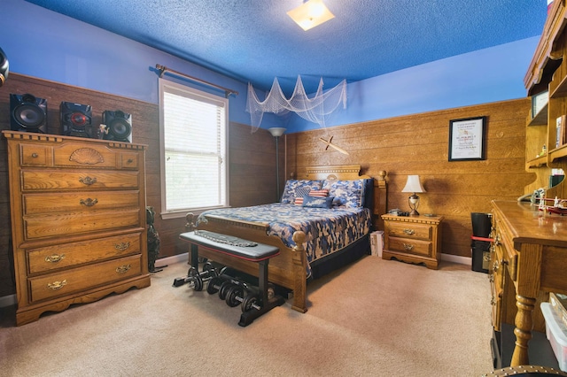 4362 Bridgestone Cir, Bartlett, TN 38135 - bedroom with a textured ceiling, light carpet, and wood walls