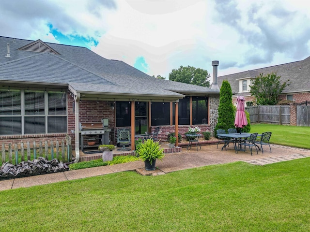 4362 Bridgestone Cir, Bartlett, TN 38135 - back of house with brick siding, a patio, and a shingled roof
