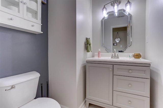 8973 E Carrollwood Ln, Memphis, TN 38016 - bathroom with toilet and vanity