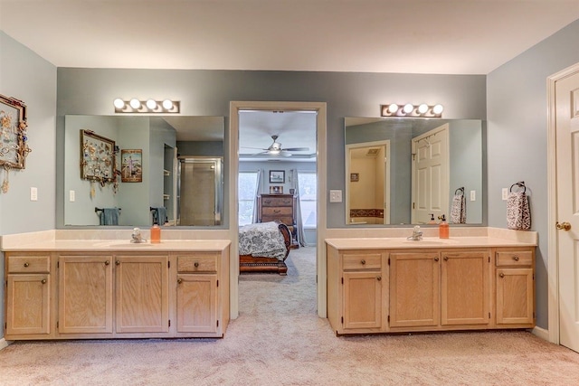 8973 E Carrollwood Ln, Memphis, TN 38016 - full bath with a shower stall, two vanities, and carpet