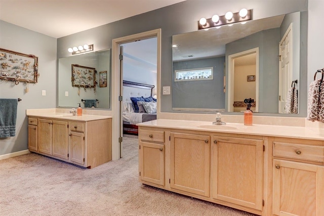 8973 E Carrollwood Ln, Memphis, TN 38016 - full bathroom with ensuite bathroom, two vanities, and carpet