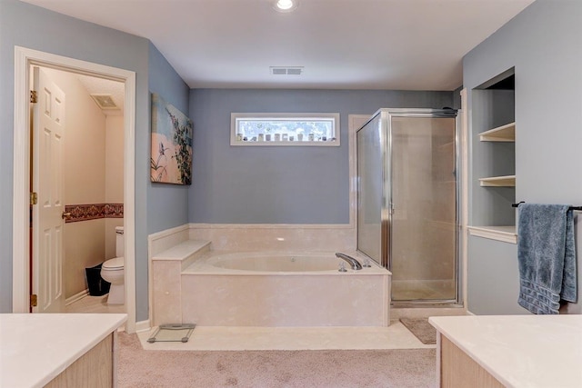 8973 E Carrollwood Ln, Memphis, TN 38016 - bathroom with a bath, vanity, and a shower stall