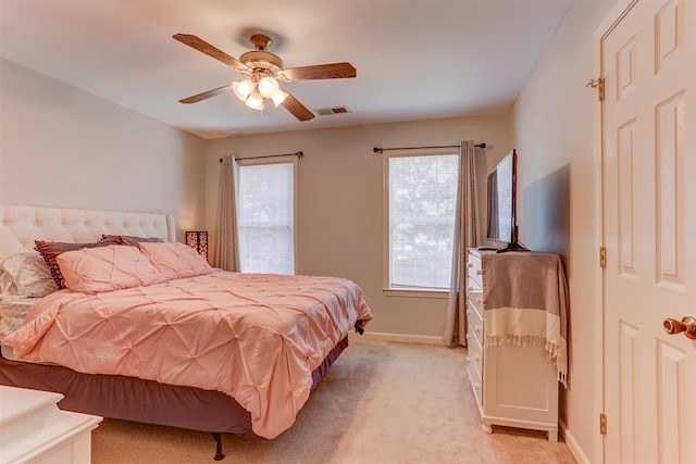 8973 E Carrollwood Ln, Memphis, TN 38016 - bedroom with light carpet and ceiling fan