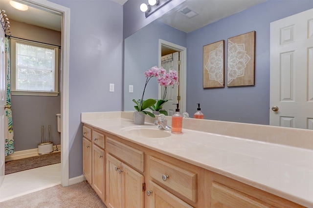 8973 E Carrollwood Ln, Memphis, TN 38016 - bathroom with vanity, a shower with curtain, and tile patterned floors