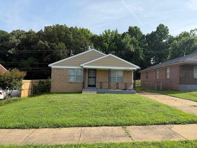 1190 Elder Rd, Memphis, TN 38109 - bungalow-style home featuring a porch and brick siding