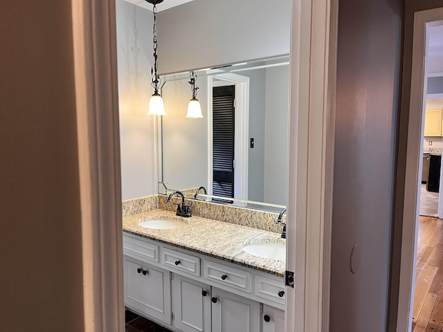 4282 Millbranch Rd, Memphis, TN 38116 - bathroom featuring double vanity and wood finished floors