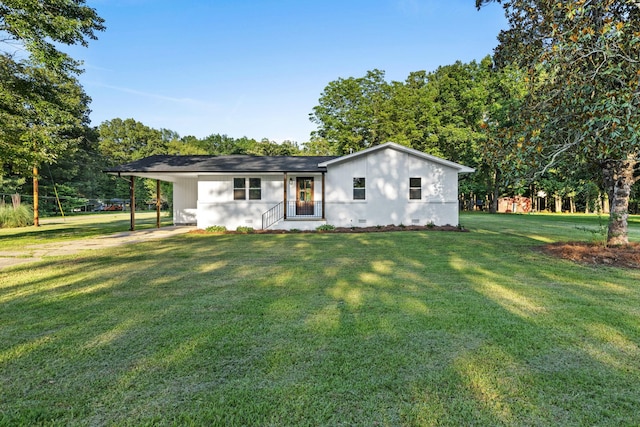 17 County Road 233rd Rd, Corinth, MS 38834 - view of front of home with a front lawn and a carport