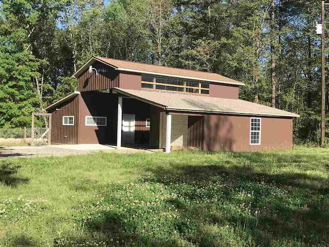 exterior space with a lawn