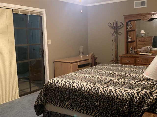 bedroom with carpet floors and ornamental molding