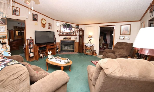 living room with a textured ceiling, ornamental molding, and dark colored carpet