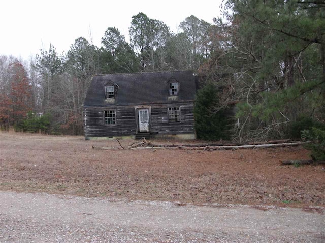 view of new england style home