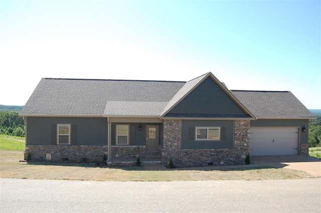 view of front facade with a porch and a garage