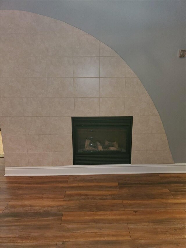 475 N Highland Avenue 3h, Memphis, TN 38122 - details featuring a fireplace and wood-type flooring