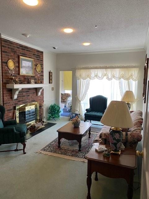 carpeted living room with crown molding, brick wall, a brick fireplace, and a textured ceiling