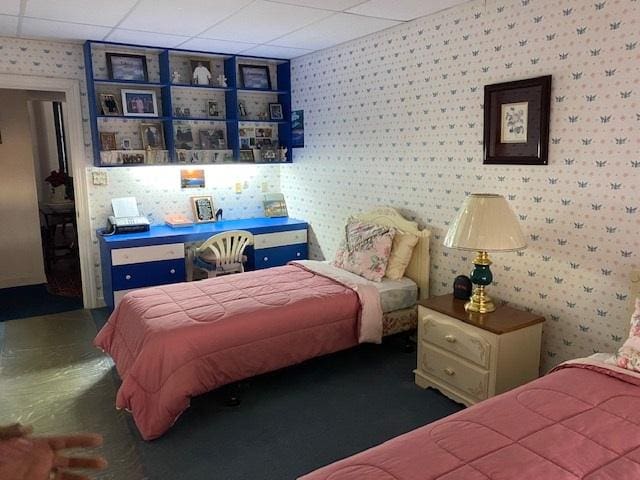 bedroom featuring a paneled ceiling