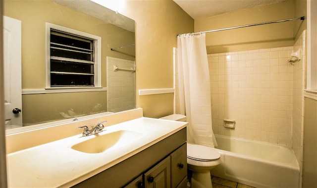 full bathroom featuring toilet, shower / tub combo, tile flooring, a textured ceiling, and vanity