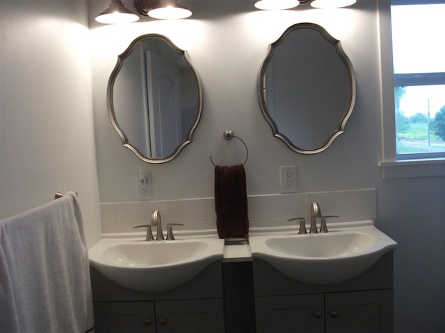 bathroom with dual vanity