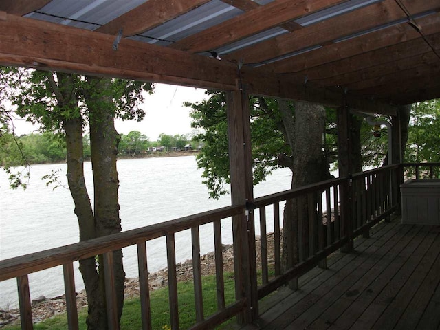 wooden terrace with a water view