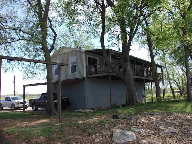 back of property with a deck