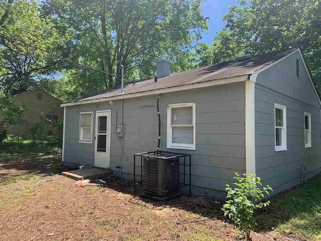 view of home's exterior with central AC