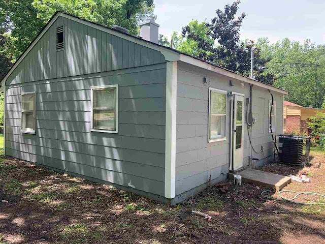 view of home's exterior with central AC