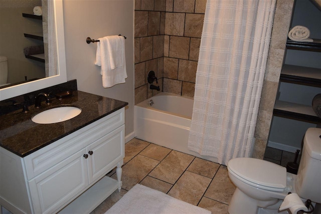 full bathroom featuring tile flooring, toilet, vanity, and shower / tub combo with curtain