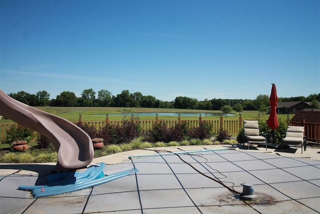 view of terrace featuring a covered pool