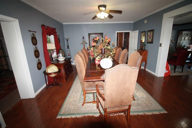 180 Holly Grove Road, Covington, TN 38019 - dining space with dark hardwood / wood-style flooring, ceiling fan, and crown molding