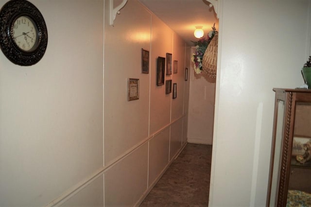 hallway with dark carpet