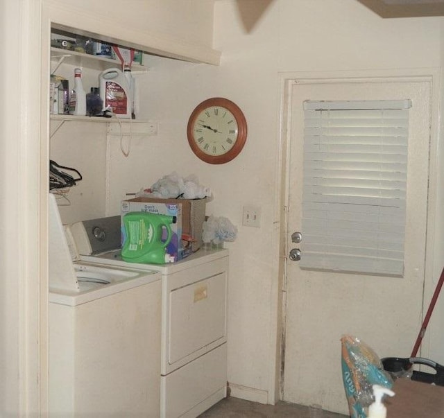 laundry room featuring washing machine and dryer