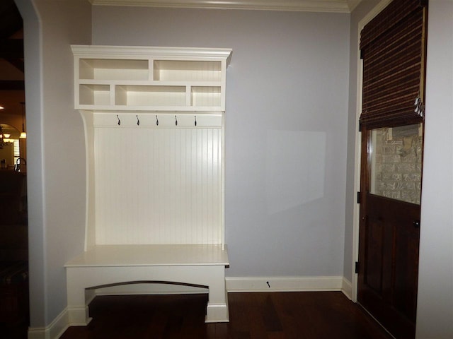 mudroom with a chandelier, crown molding, and dark hardwood / wood-style flooring