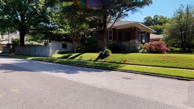 view of front of home with a front yard