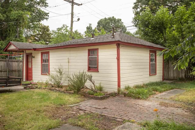 view of home's exterior featuring a lawn