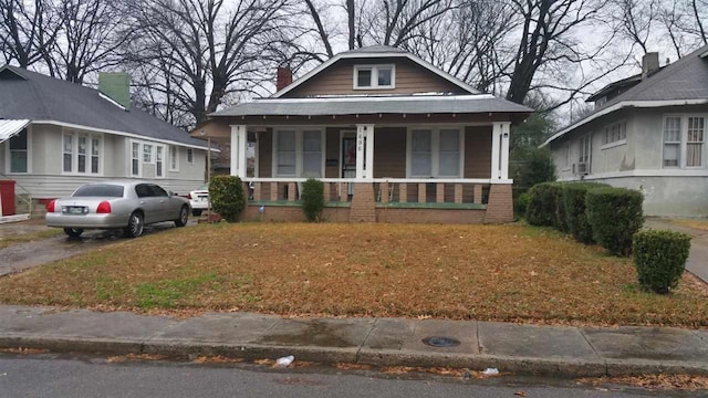 bungalow-style home featuring a porch