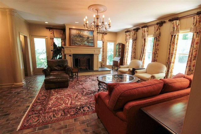 9351 Rocky Valley Cv, Memphis, TN 38018 - living room with crown molding, plenty of natural light, and a chandelier