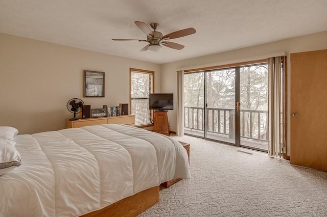 carpeted bedroom with access to outside and ceiling fan