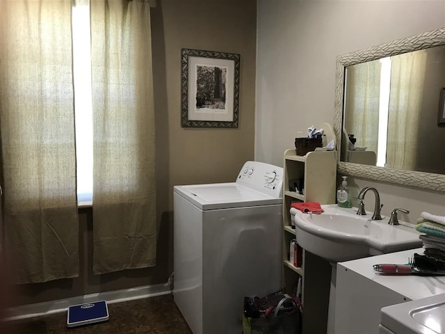 laundry room featuring washer / clothes dryer and sink