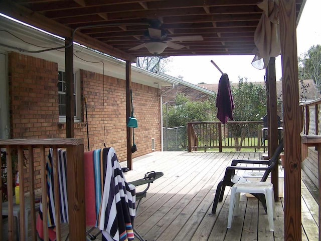 wooden deck with ceiling fan