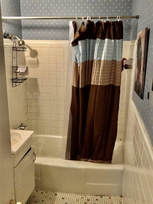 bathroom featuring shower / bath combination with curtain, vanity, and tile flooring