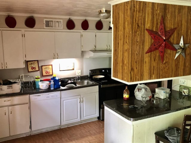 kitchen with dishwasher, light parquet floors, electric stove, and white cabinetry