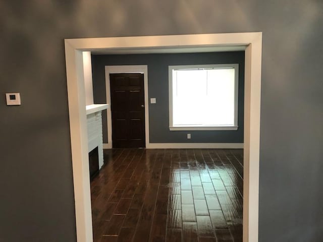 interior space with dark wood-type flooring