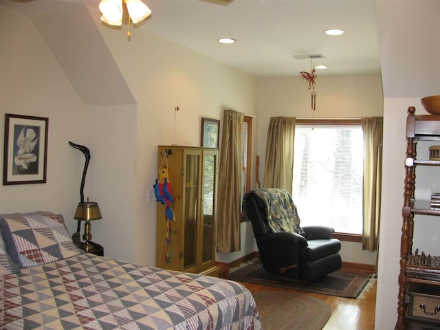 bedroom featuring hardwood / wood-style flooring