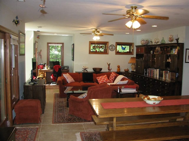 tiled living room with ceiling fan